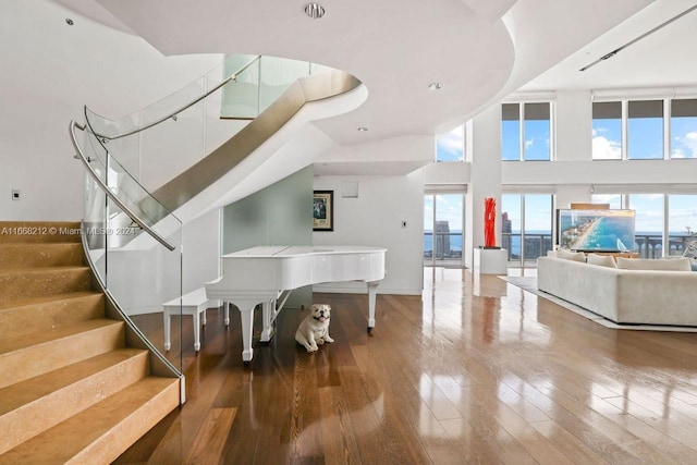 450 Alton Rd Unit Ph2, Miami Beach, FL 33139 - entryway with plenty of natural light, hardwood / wood-style flooring, and a high ceiling