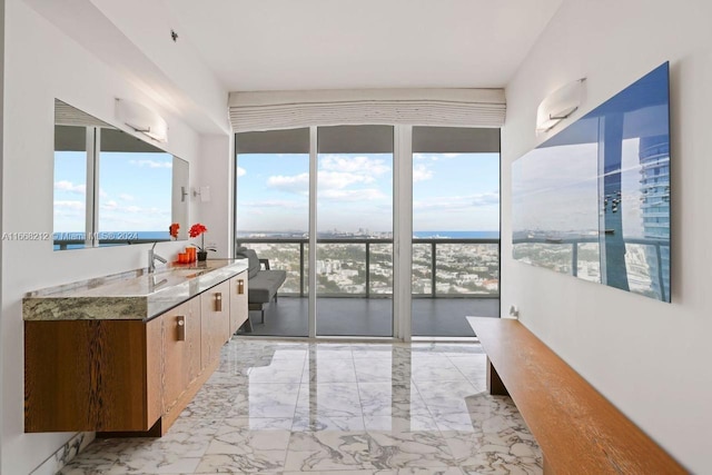 bathroom featuring a water view and vanity