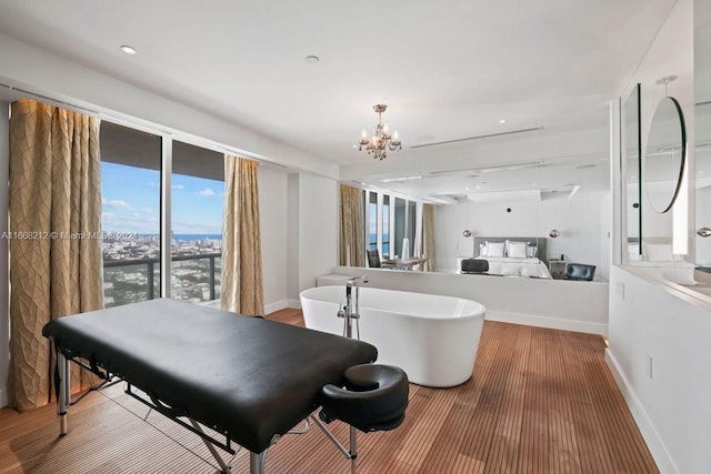 450 Alton Rd Unit Ph2, Miami Beach, FL 33139 - interior space featuring a chandelier and baseboards