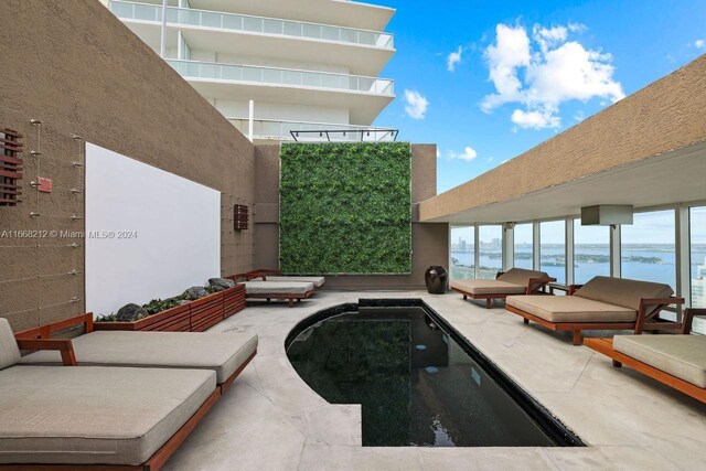450 Alton Rd Unit Ph2, Miami Beach, FL 33139 - view of pool featuring a water view