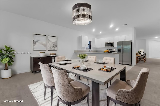 dining room featuring an inviting chandelier