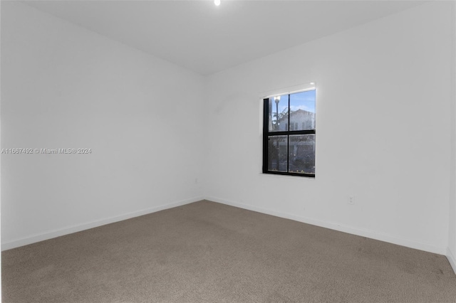 empty room with carpet floors