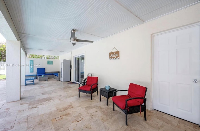 view of patio featuring outdoor lounge area and ceiling fan