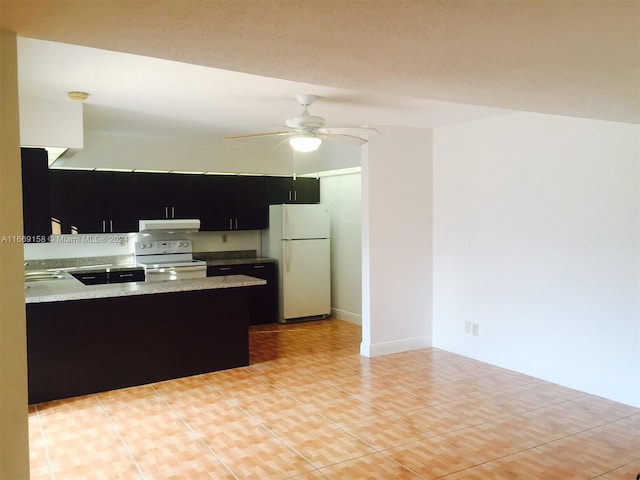 kitchen with ceiling fan, light tile patterned floors, kitchen peninsula, and white appliances