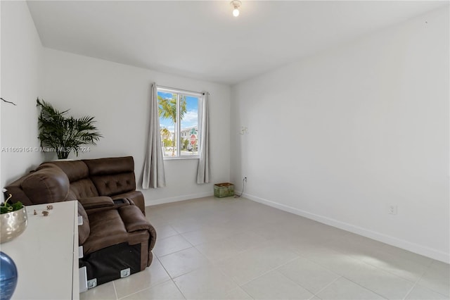 sitting room featuring light tile patterned flooring