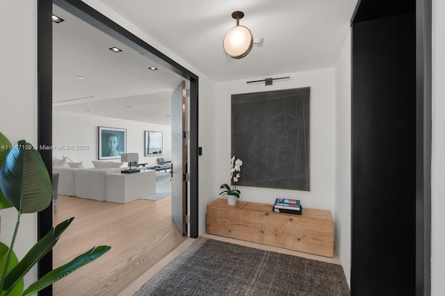 hall featuring light hardwood / wood-style flooring