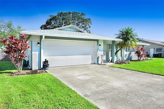 single story home featuring a front yard and a garage