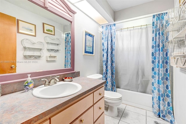 full bathroom featuring vanity, tile patterned flooring, shower / tub combo, and toilet