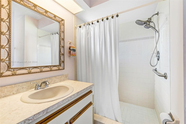 bathroom with vanity and a shower with curtain