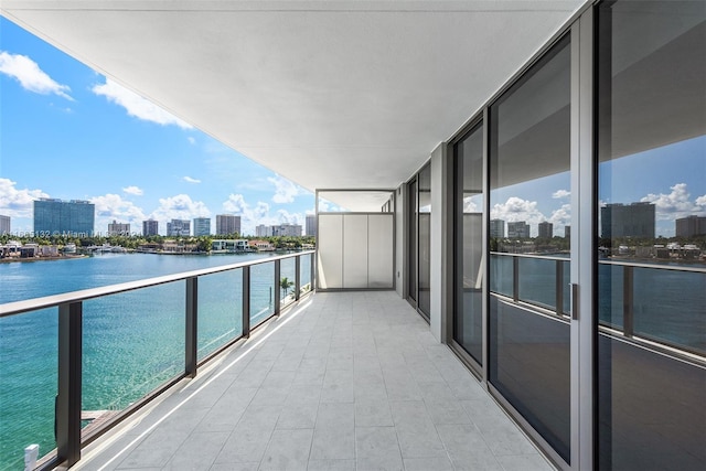 balcony featuring a water view