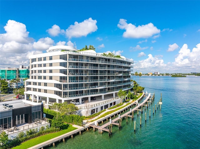 view of building exterior featuring a water view