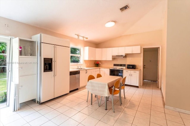 kitchen with visible vents, paneled refrigerator, range with electric cooktop, dishwasher, and under cabinet range hood