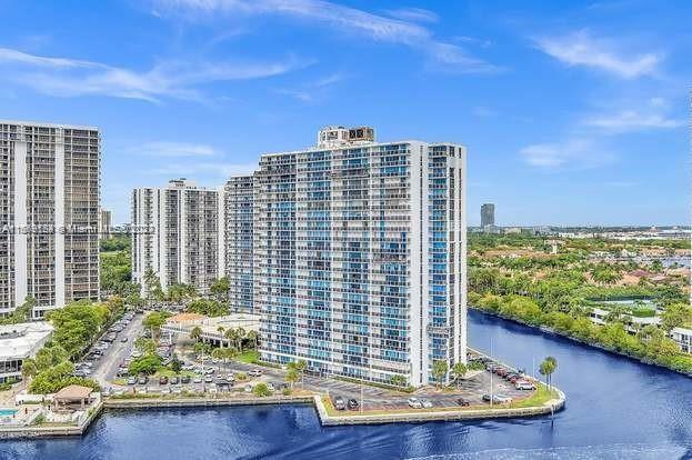 view of building exterior with a water view