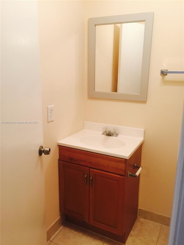 bathroom with vanity and tile patterned floors