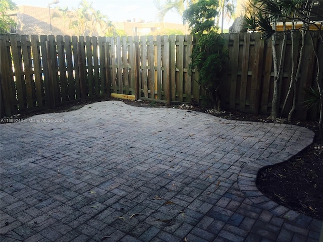 8203 SW 23rd Ct Unit 21B, North Lauderdale, FL 33068 - fenced backyard featuring a patio