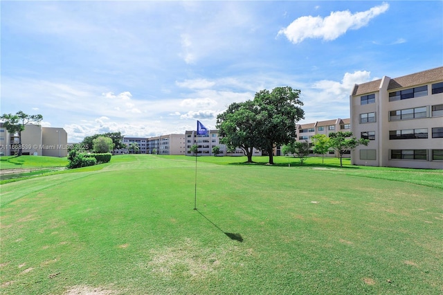 surrounding community featuring a yard