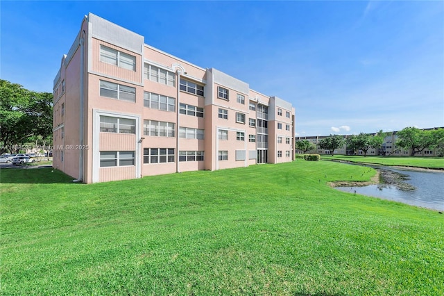 view of building exterior featuring a water view