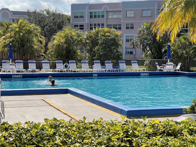 pool featuring fence