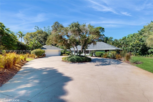 view of side of home with a garage