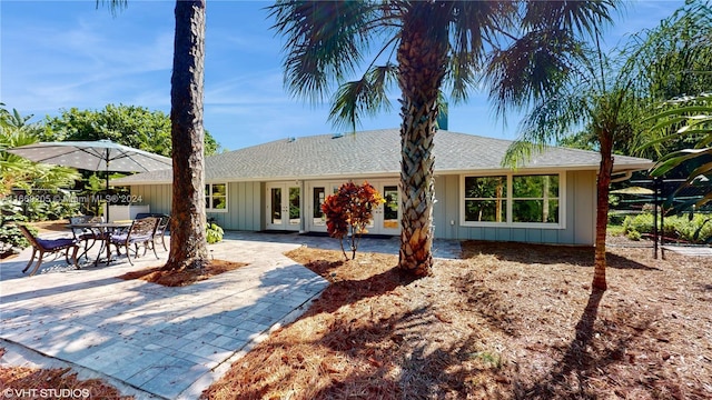 rear view of house featuring french doors and a patio