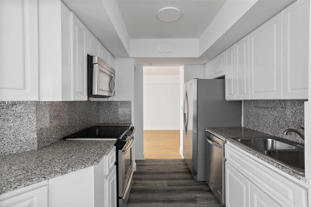 unfurnished room with light wood-type flooring