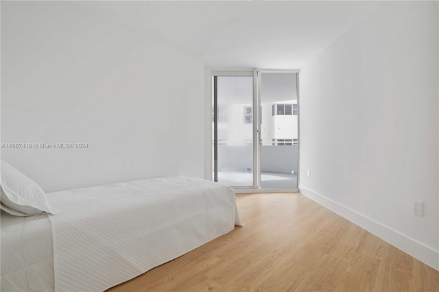 bedroom featuring light hardwood / wood-style flooring