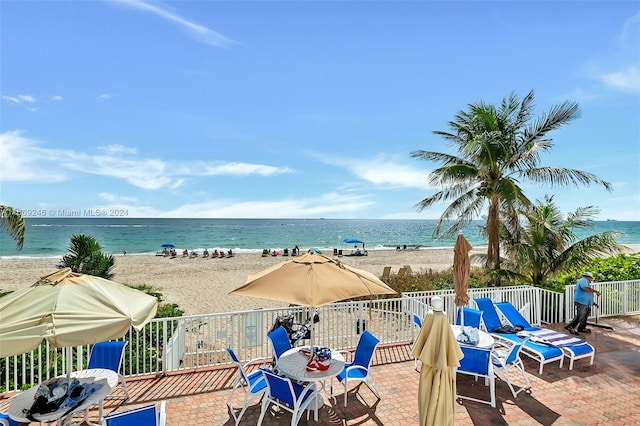 property view of water featuring a beach view