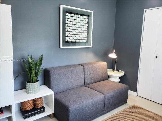 living room with light tile patterned floors