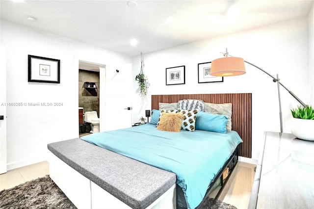 bedroom featuring light tile patterned floors