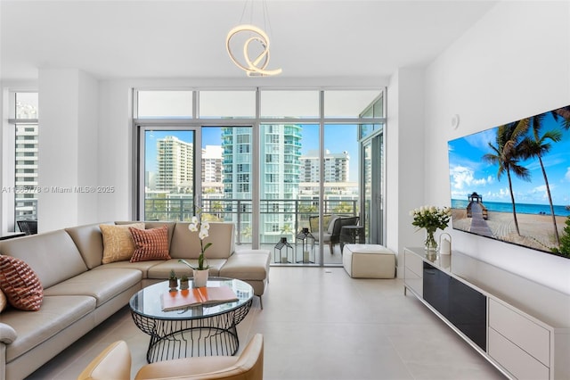 living room featuring floor to ceiling windows