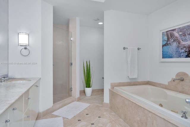 bathroom with shower with separate bathtub, tile patterned flooring, and vanity