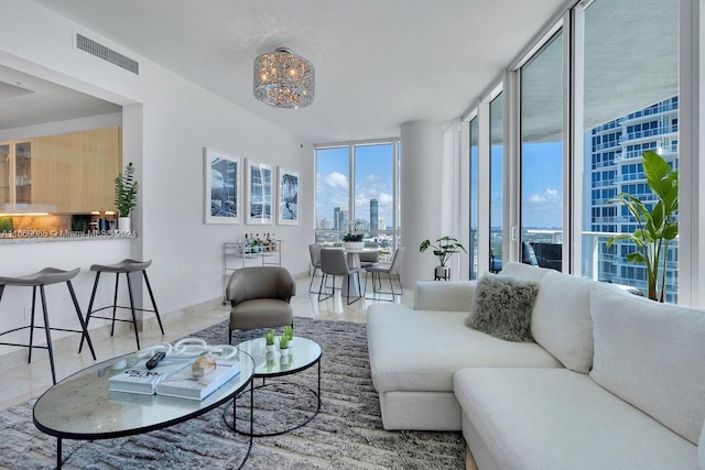 100 S Pointe Dr Unit 2208, Miami Beach, FL 33139 - living room with floor to ceiling windows and a view of city