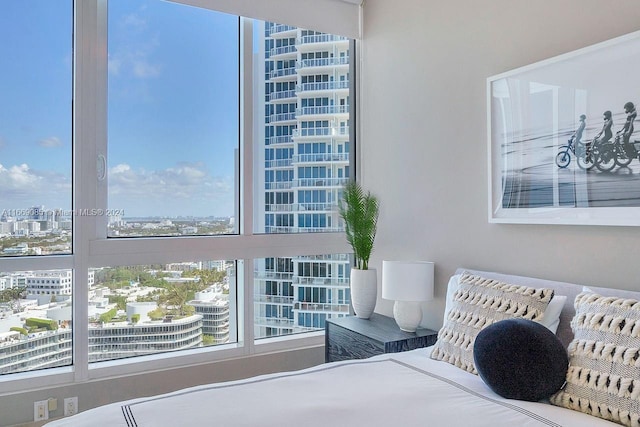 100 S Pointe Dr Unit 2208, Miami Beach, FL 33139 - bedroom featuring multiple windows and a view of city