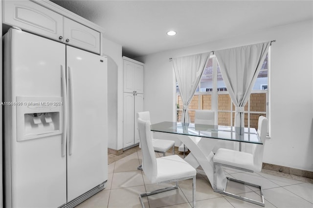 dining room featuring light tile patterned floors