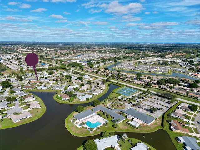 drone / aerial view with a water view