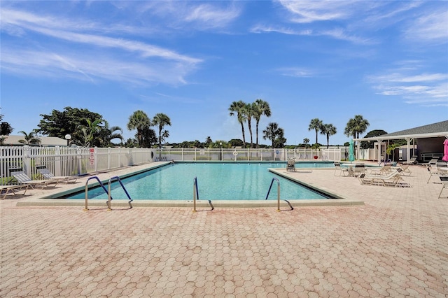 view of swimming pool featuring a patio