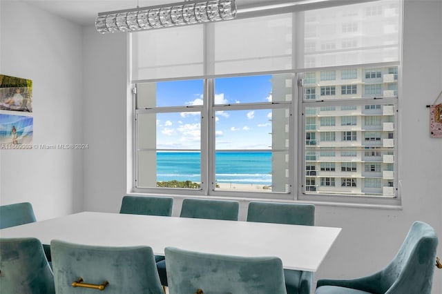 dining room with a water view