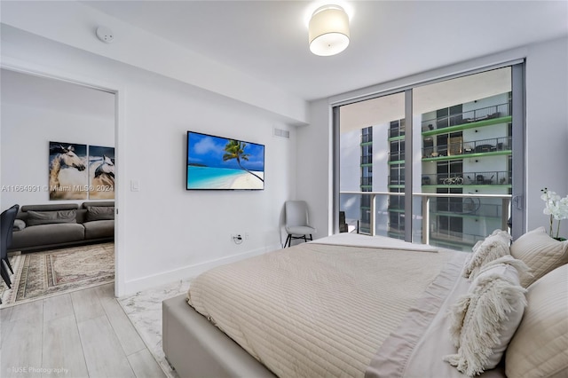 bedroom featuring light hardwood / wood-style floors