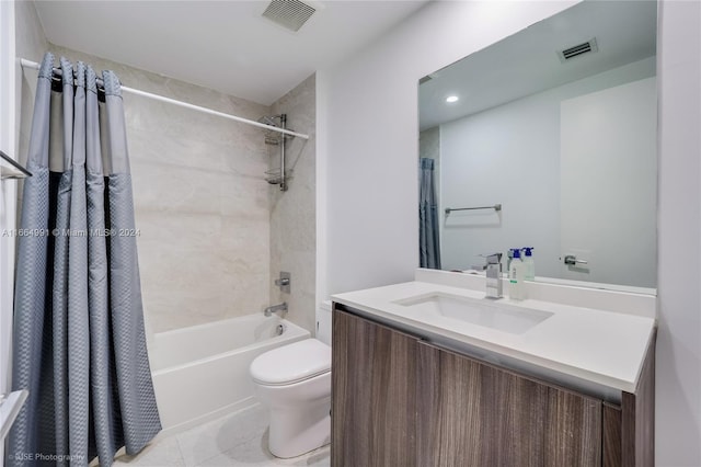 full bathroom with shower / tub combo with curtain, tile patterned flooring, vanity, and toilet