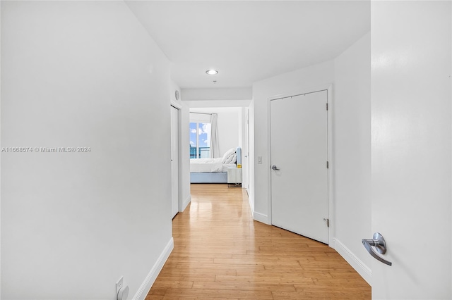 corridor featuring light wood-type flooring