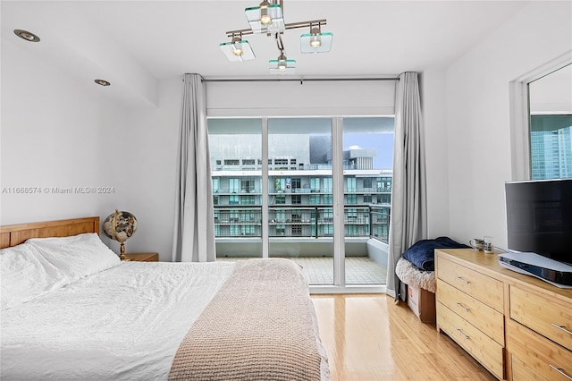 bedroom featuring light wood-type flooring