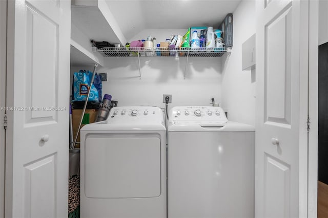 clothes washing area featuring washing machine and dryer