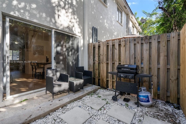 view of patio with a grill