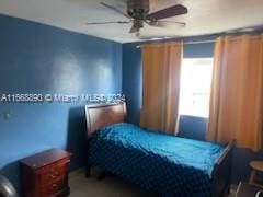 bedroom featuring ceiling fan