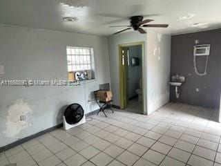 spare room with ceiling fan