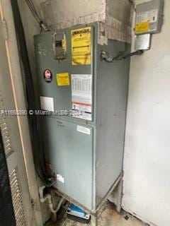 utility room with heating unit