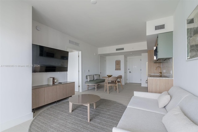 tiled living room with sink