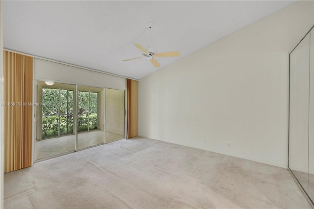 spare room with carpet and ceiling fan