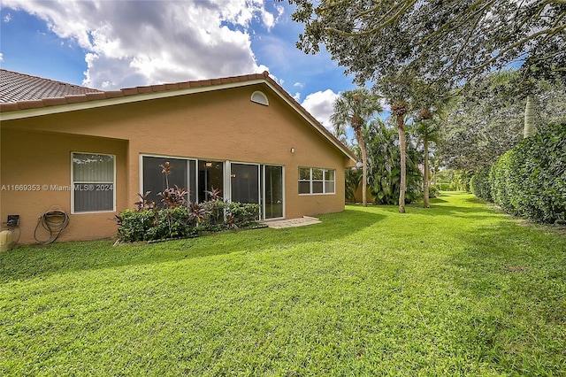 exterior space featuring a lawn