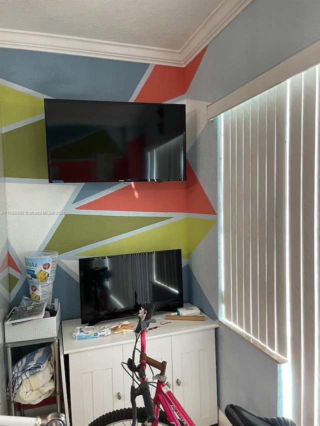 interior space featuring crown molding